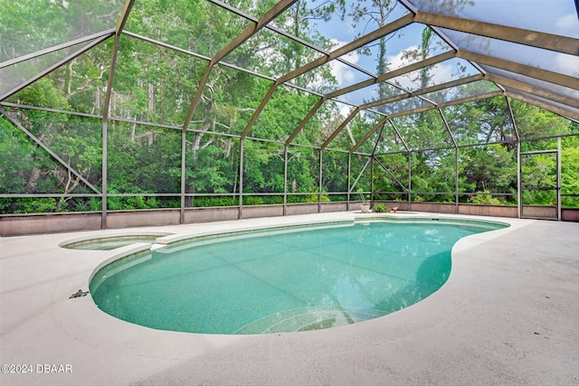 view of pool featuring a patio and a lanai