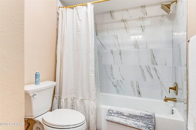 bathroom with shower / tub combo with curtain and toilet