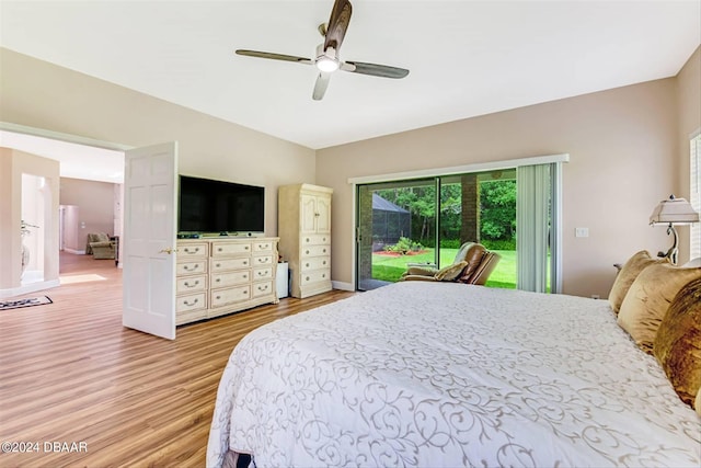 bedroom featuring ceiling fan, access to exterior, and light hardwood / wood-style flooring