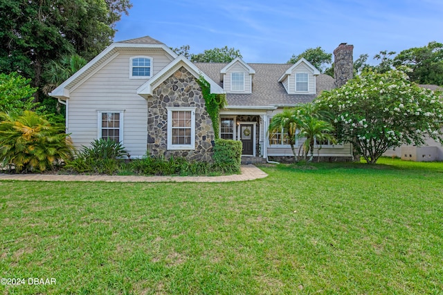 view of front of house with a front lawn