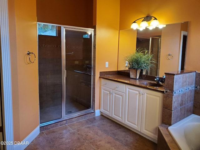 7 Old Mcduffie Cir, Ormond Beach, FL 32174 - bathroom with a shower stall, a bath, vanity, and baseboards