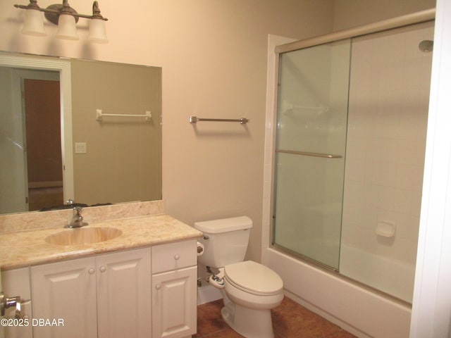 7 Old Mcduffie Cir, Ormond Beach, FL 32174 - full bath with vanity, toilet, shower / bath combination with glass door, and tile patterned flooring