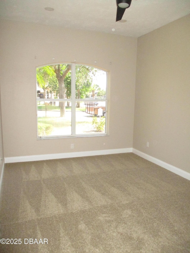 7 Old Mcduffie Cir, Ormond Beach, FL 32174 - carpeted spare room featuring baseboards and a ceiling fan