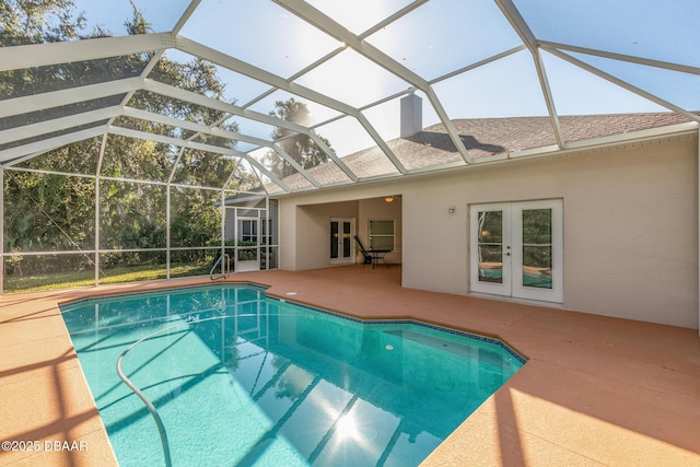 7 Old Mcduffie Cir, Ormond Beach, FL 32174 - outdoor pool featuring french doors, a patio area, and glass enclosure