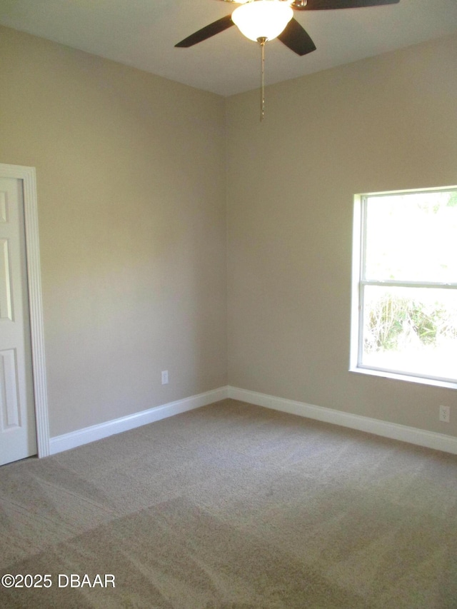 7 Old Mcduffie Cir, Ormond Beach, FL 32174 - empty room with ceiling fan, carpet floors, and baseboards
