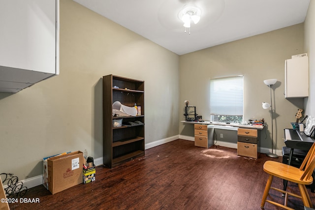 office space with ceiling fan and dark hardwood / wood-style flooring