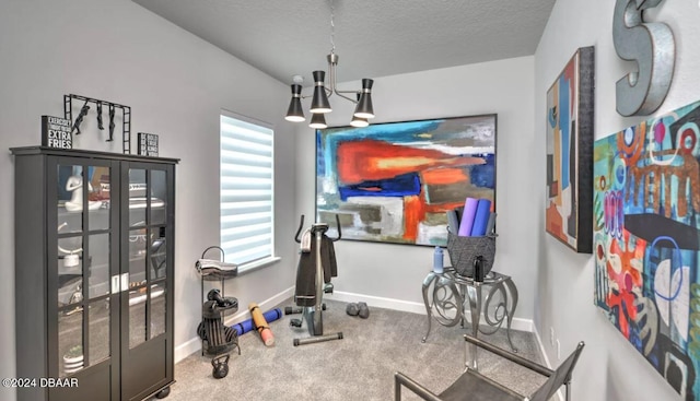 workout area with french doors, carpet floors, a textured ceiling, and an inviting chandelier