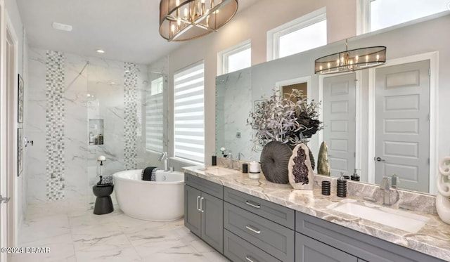 497 Stirling Bridge Dr, Ormond Beach, FL 32174 - full bath with a chandelier, marble look tiles, a marble finish shower, double vanity, and recessed lighting
