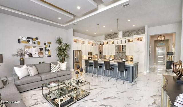 497 Stirling Bridge Dr, Ormond Beach, FL 32174 - living area featuring recessed lighting and light marble finish floors