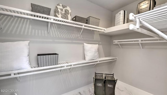 497 Stirling Bridge Dr, Ormond Beach, FL 32174 - spacious closet featuring marble finish flooring