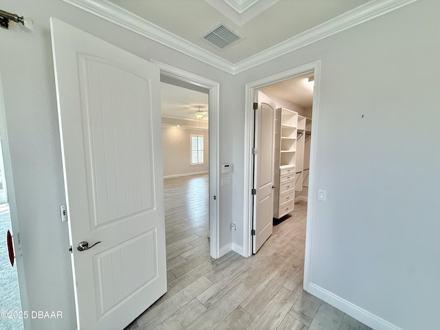 24 Shear Water Trl, Ormond Beach, FL 32174 - hall with crown molding, light wood-style floors, and baseboards