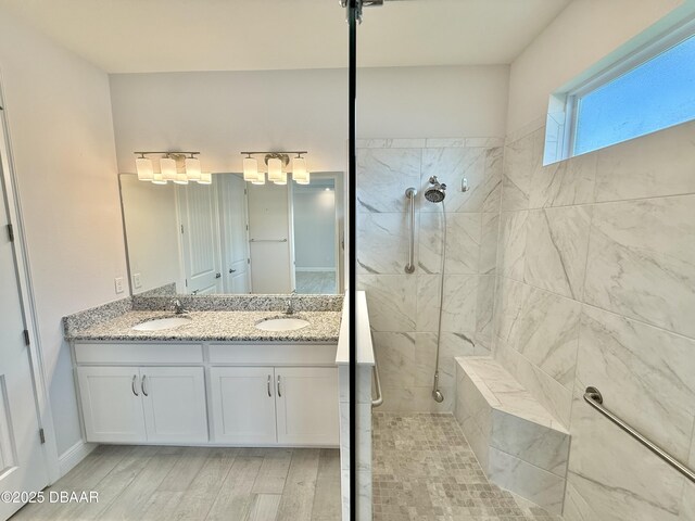 24 Shear Water Trl, Ormond Beach, FL 32174 - full bath with walk in shower, double vanity, and wood finished floors