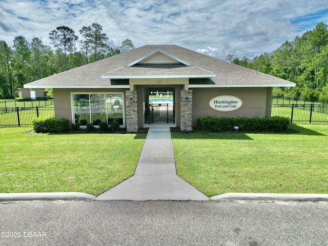 24 Shear Water Trl, Ormond Beach, FL 32174 - view of front facade with a shingled roof and stucco siding