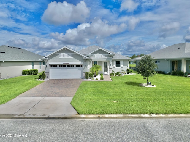 24 Shear Water Trl, Ormond Beach, FL 32174 - craftsman inspired home featuring driveway, an attached garage, a front lawn, and stucco siding