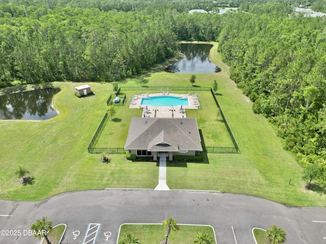 24 Shear Water Trl, Ormond Beach, FL 32174 - drone / aerial view of a large body of water, a pool area, and a forest