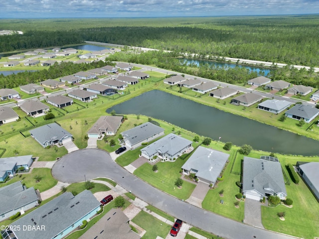 24 Shear Water Trl, Ormond Beach, FL 32174 - aerial view of property and surrounding area featuring a heavily wooded area, a large body of water, and nearby suburban area