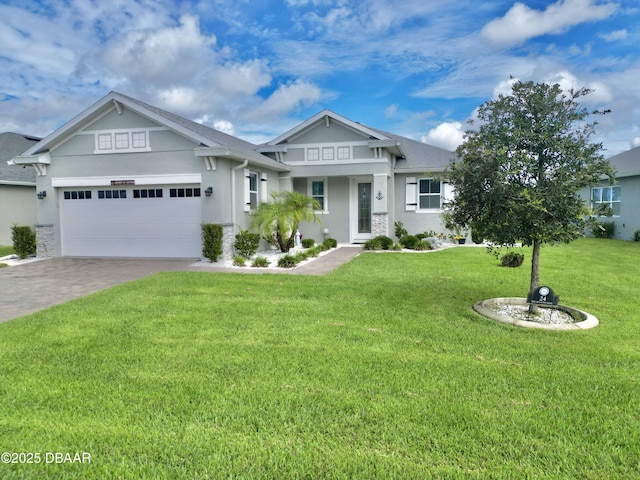24 Shear Water Trl, Ormond Beach, FL 32174 - craftsman-style home with a front yard, stucco siding, driveway, a garage, and a shingled roof