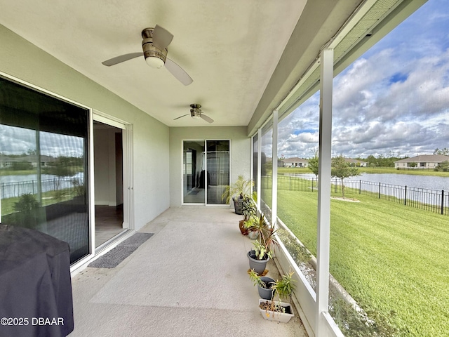 24 Shear Water Trl, Ormond Beach, FL 32174 - sunroom with a water view and a ceiling fan