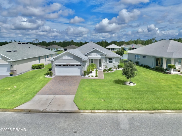 24 Shear Water Trl, Ormond Beach, FL 32174 - view of front of property featuring driveway, a front lawn, a residential view, and a garage