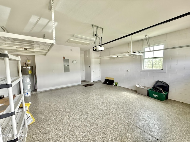 24 Shear Water Trl, Ormond Beach, FL 32174 - garage with electric panel, electric water heater, a garage door opener, concrete block wall, and baseboards