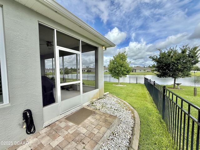 24 Shear Water Trl, Ormond Beach, FL 32174 - view of yard with a sunroom and a water view
