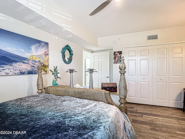 bedroom featuring ceiling fan, a closet, and wood-type flooring