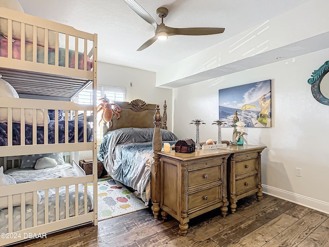 bedroom featuring ceiling fan and dark hardwood / wood-style flooring