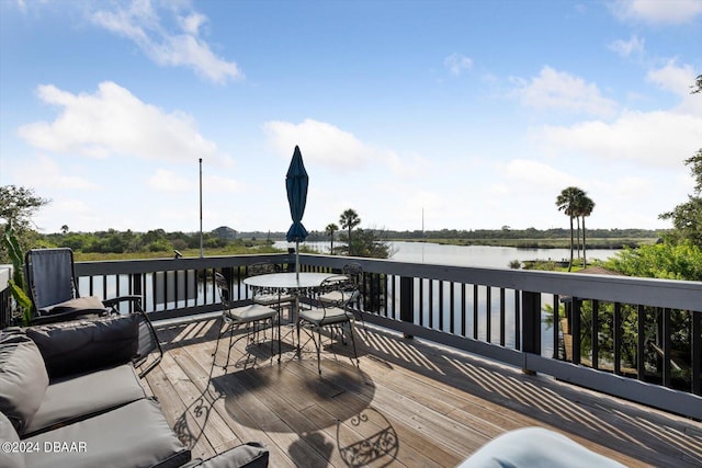 deck featuring a water view