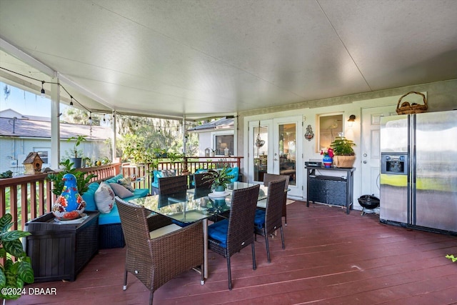 sunroom / solarium with vaulted ceiling