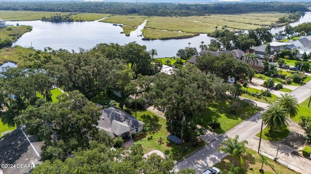 drone / aerial view with a water view