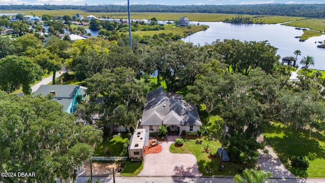 birds eye view of property featuring a water view