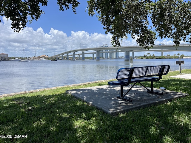 411 N Halifax Ave Unit 203, Daytona Beach, FL 32118 - view of community featuring a water view and a lawn