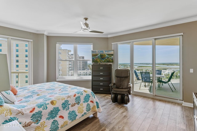 bedroom featuring access to outside, ceiling fan, light hardwood / wood-style floors, and ornamental molding