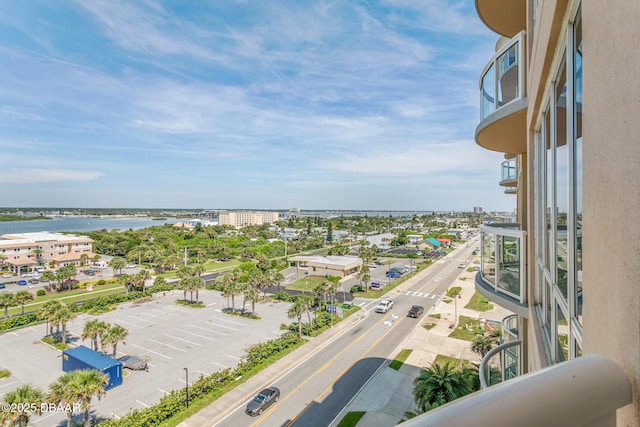 balcony featuring a water view