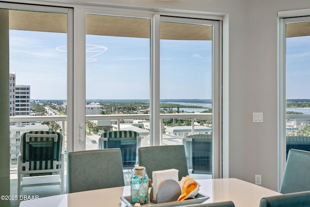 dining room with a water view