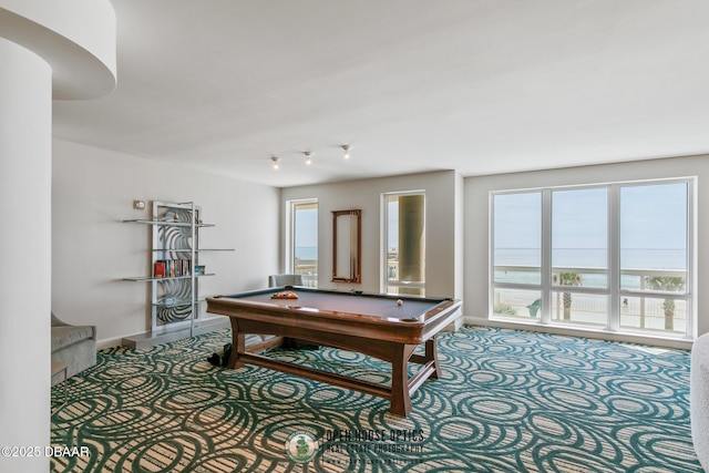 game room featuring carpet flooring, a water view, and pool table