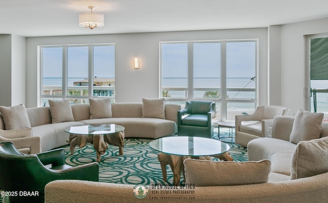 living room featuring a water view