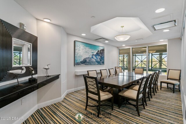 dining area featuring carpet flooring