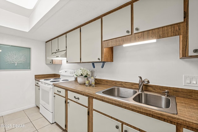 kitchen with light tile patterned floors, white range with electric cooktop, under cabinet range hood, wooden counters, and a sink