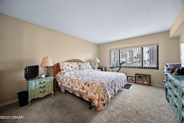 carpeted bedroom with a textured ceiling