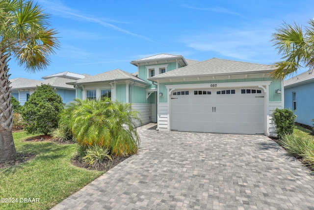 view of front of home featuring a garage