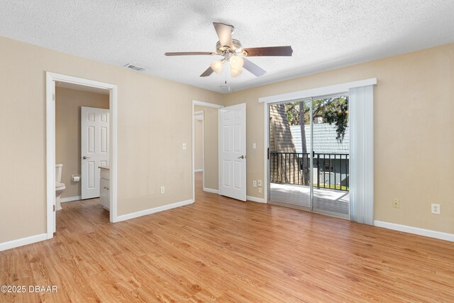 bathroom with vanity, hardwood / wood-style flooring, and toilet