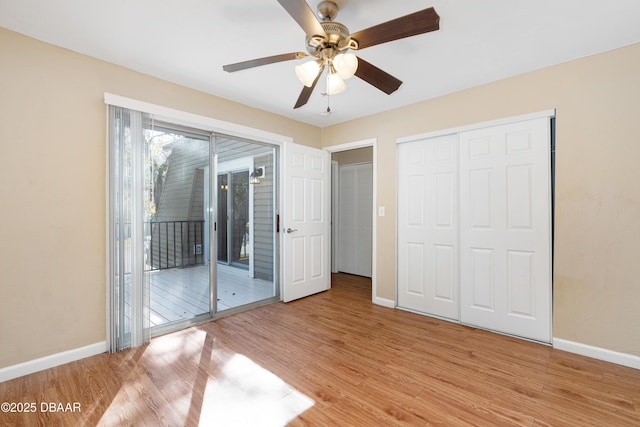 unfurnished bedroom featuring a closet, access to exterior, ceiling fan, and light hardwood / wood-style flooring