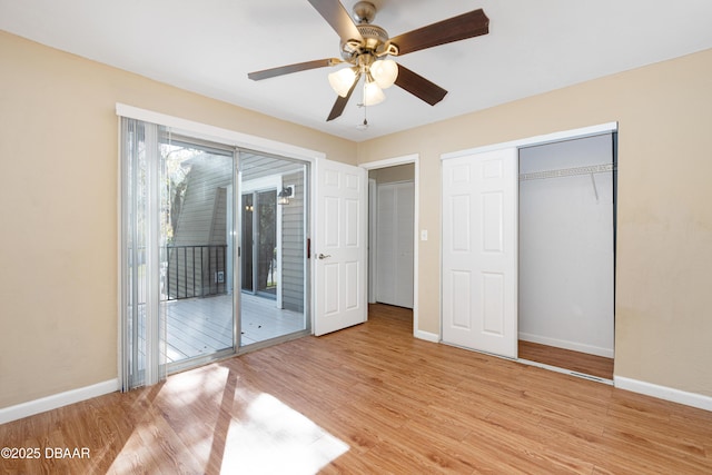 unfurnished bedroom with light hardwood / wood-style flooring, access to outside, a closet, and ceiling fan