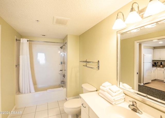 bathroom featuring tile patterned flooring, a textured ceiling, toilet, and shower / tub combo with curtain