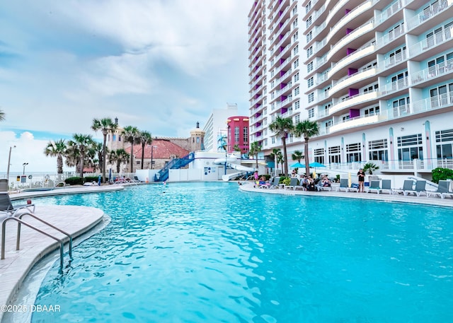 community pool with a patio