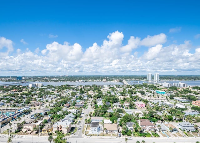 birds eye view of property featuring a water view and a residential view