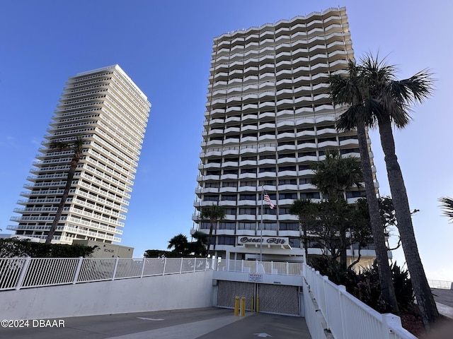 view of building exterior featuring fence