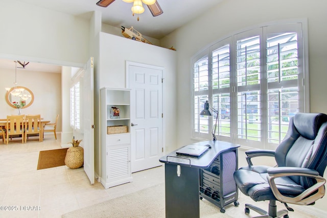 3288 Spruce Creek Gln, Port Orange, FL 32128 - office area featuring a chandelier, a ceiling fan, and light tile patterned flooring