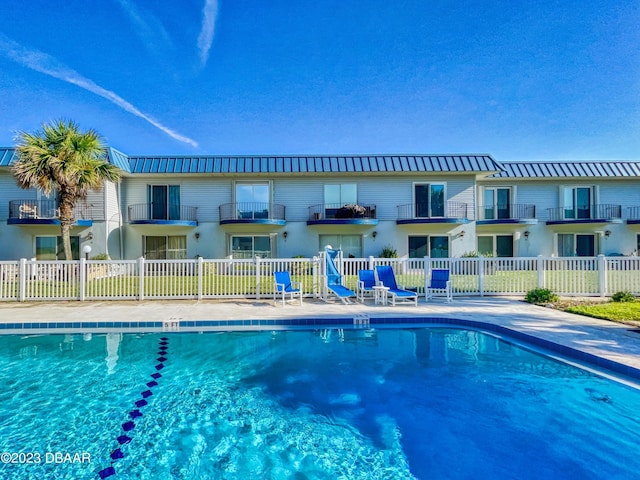 community pool with fence